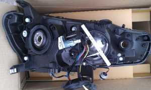 Лампа ближнего света Лансер 10. Электрооборудование и освещение. Особенности замены