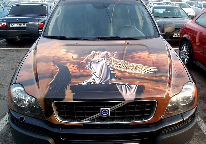 Наклейка на капоте авто в виде девушки фэнтези Наклейка на капоте авто в виде девушки фэнтези